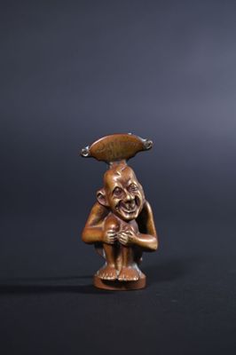 Heurtoir de porte en bronze représentant un personnage humor…