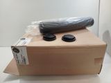 a cardboard box with two plastic cups on top of it