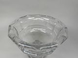 a clear glass vase with a diamond design on it