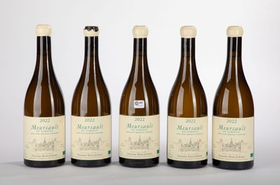 four bottles of wine are lined up on a white surface