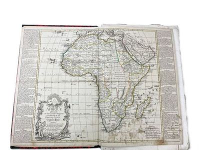 an open book with a map of africa on it