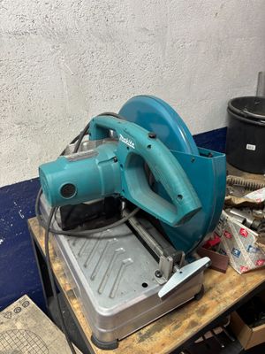 a blue machine that is sitting on top of a table