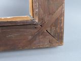 a picture of a wooden frame with a mirror in it