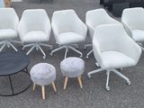 several chairs and stools are arranged in a circle on the floor