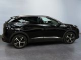 the black suv is parked in a large room with a gray floor