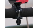 a close up of a bike handlebar with a red light on it