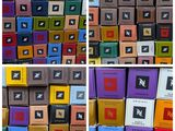 many different types of boxes stacked on top of each other