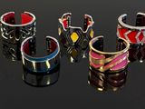 many different rings that are sitting on a table