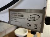 a label on a machine that says food master