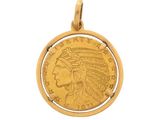 a gold coin with an indian head on it