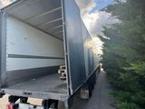a truck that is parked on the side of the road