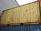 a yellow container sitting on top of a blue container