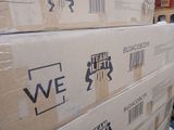 many boxes stacked on top of each other in a warehouse