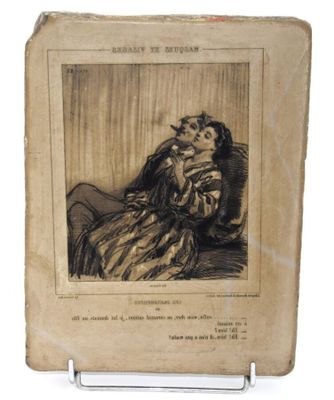 un vieux livre avec l'image d'une femme et d'un chat