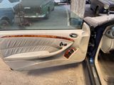 a car that has a glass top in the back of it