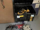 a box of tools and a pair of shoes on the floor