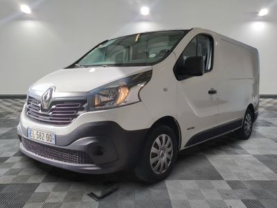 a picture of a white van on a checkered floor