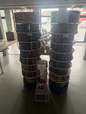 two stacks of dvds stacked on top of each other in a store