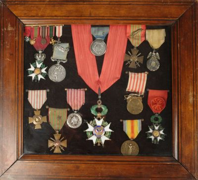a picture of a framed picture of medals and medals