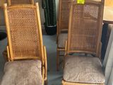 four chairs that are sitting next to each other