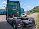 a truck that is parked on the side of the road