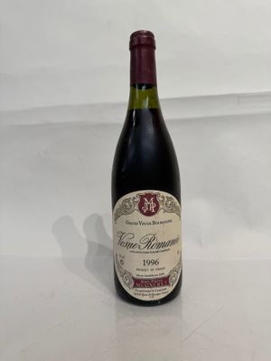 a bottle of wine that is sitting on a table