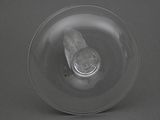 underside view of a clear plastic cup with a piece of paper in it