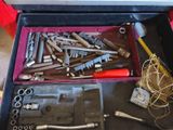 many tools in a tool box on the table