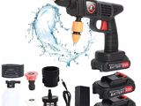 a close up of a cordless drill with a battery and accessories