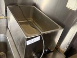 a stainless steel sink with a faucet and a faucet