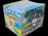 a box of pokemon trading cards on a black background