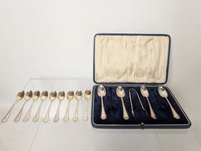 six spoons in a case on the table