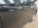 a close up of a car door handle and door handle