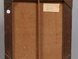 an old wooden easel with a piece of paper on top of it