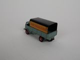 a toy truck that is sitting in the snow