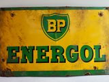an old bp energy sign is displayed on a white surface