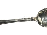 silver spoon on a white background with a silver spoon in the middle of it