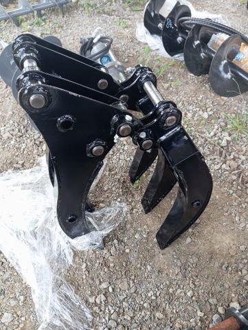 Grappin à buches pour mini-pelle 1t, axes 25mm, largeur entre ore...