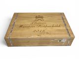 a close up of a wooden box with a label on it