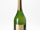 an image of a bottle of champagne on a white surface