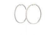 two white gold hoop earrings with diamonds on a white background