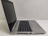a laptop computer that is sitting on a table