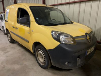 a yellow van that is parked in a garage