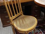 a chair that is sitting in front of a desk