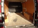 a van that has a bed in the back of it