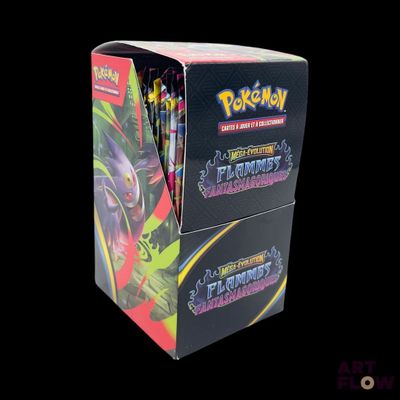 a close up of a box of pokemon trading cards on a black background