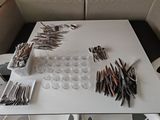 a table with a lot of utensils and spoons on it