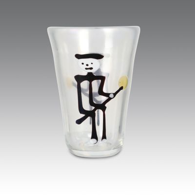 tall shot glass with a cartoon character holding a baseball bat