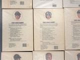 six baseball cards are stacked on top of each other on a table
