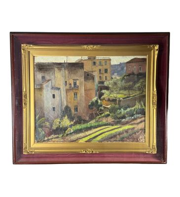 une image représentant un tableau d'un village, dans un cadre en bois
